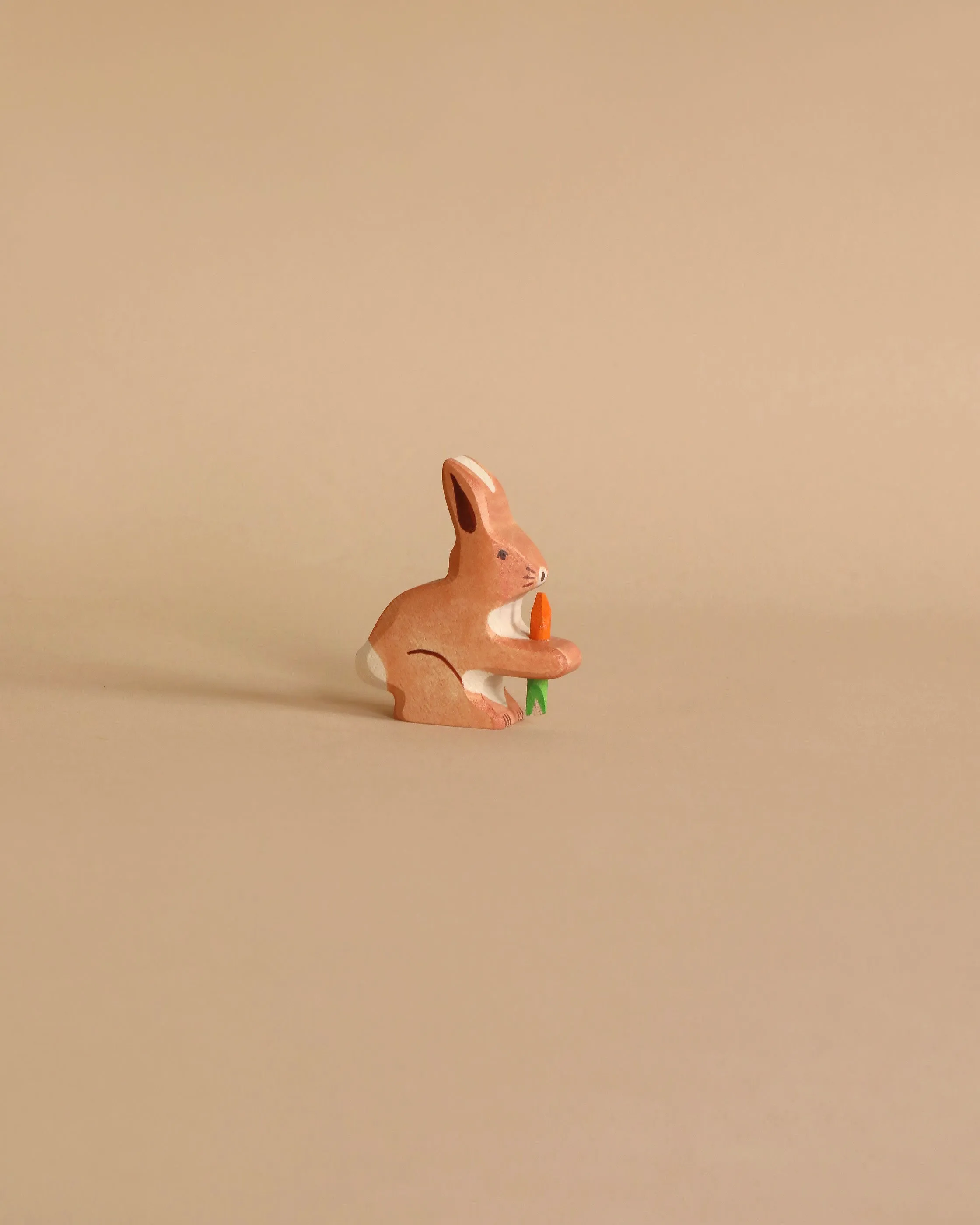 Holztiger Rabbit With Carrot Odin Parker